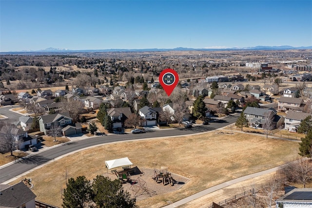 aerial view featuring a residential view and a mountain view