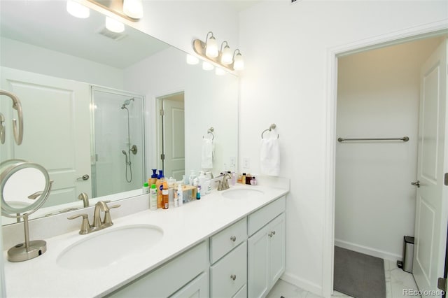 8376 Lorenzo Ln Unit A, Highlands Ranch, CO 80129 - bathroom featuring a shower stall and double vanity