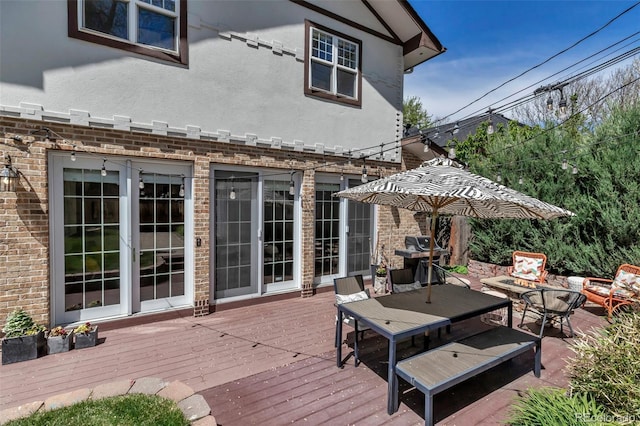 wooden terrace with grilling area