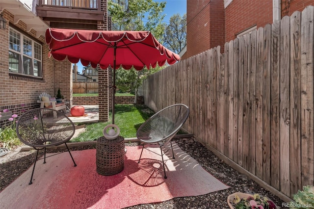 view of patio / terrace featuring a fenced backyard