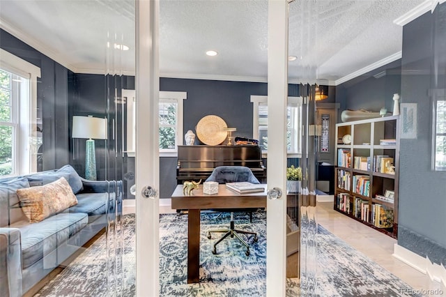 office space with recessed lighting, a textured ceiling, ornamental molding, and plenty of natural light