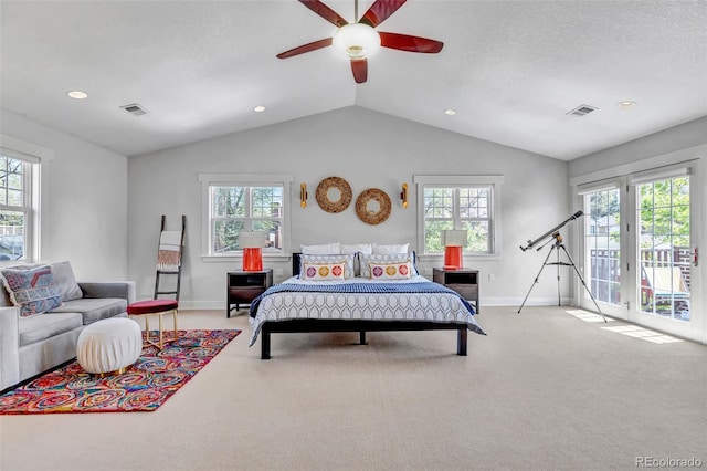 carpeted bedroom featuring baseboards, access to outside, visible vents, and multiple windows