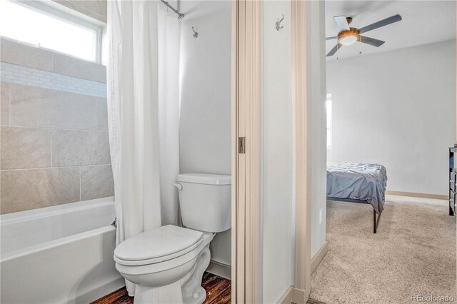 32 Trailside Cir Unit A, Salida, CO 81201 - bathroom featuring toilet, ceiling fan, shower / bath combination with curtain, and baseboards