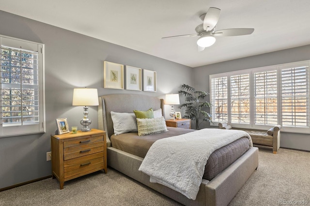 bedroom with carpet floors, baseboards, and a ceiling fan