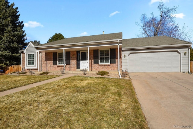 single story home featuring a garage, concrete driveway, covered porch, fence, and a front yard