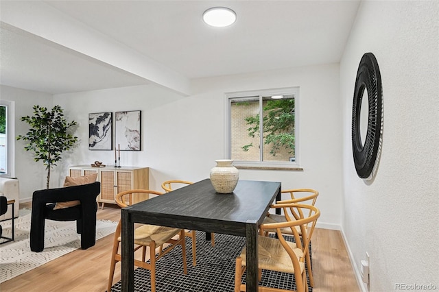 11176 W 62nd Ave, Arvada, CO 80004 - dining room with light wood-style floors and plenty of natural light