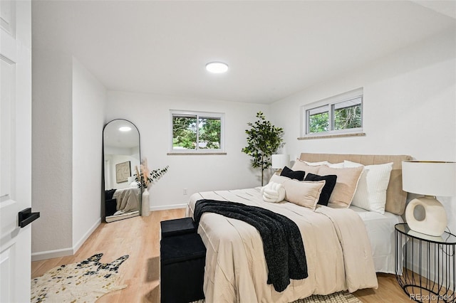 11176 W 62nd Ave, Arvada, CO 80004 - bedroom with wood finished floors and recessed lighting