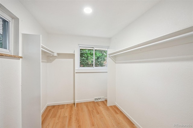 11176 W 62nd Ave, Arvada, CO 80004 - spacious closet with wood finished floors