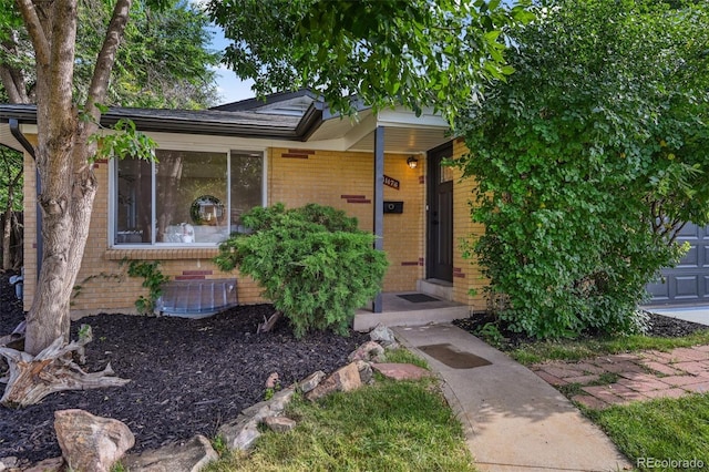 11176 W 62nd Ave, Arvada, CO 80004 - view of front of home featuring brick siding