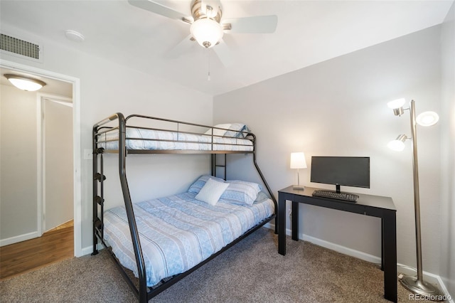 carpeted bedroom with ceiling fan