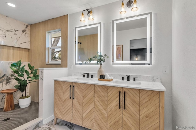 bathroom with vanity and an inviting chandelier