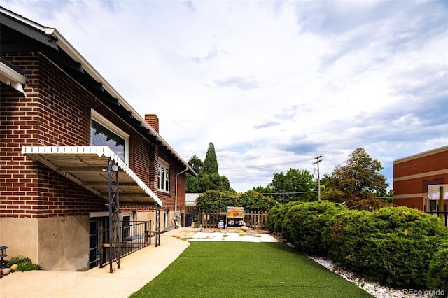 view of yard featuring fence