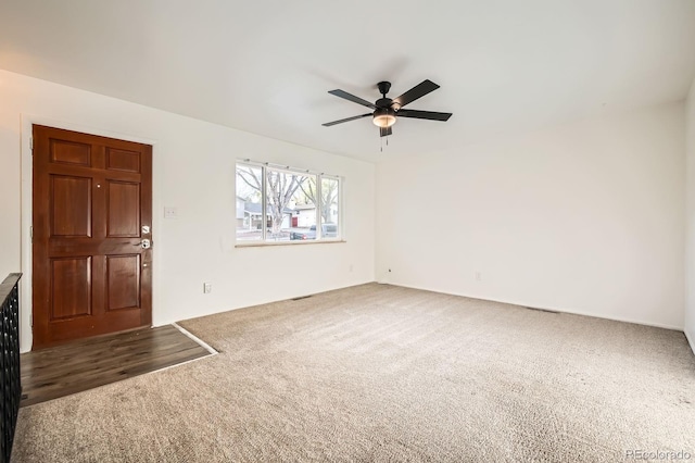 1207 Kingsley Dr, Colorado Springs, CO 80909 - entrance foyer with carpet and ceiling fan
