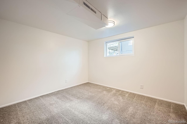 1207 Kingsley Dr, Colorado Springs, CO 80909 - spare room with carpet and baseboards
