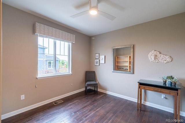 565 Pikes View Dr, Erie, CO 80516 - sitting room featuring wood finished floors, ceiling fan, and baseboards