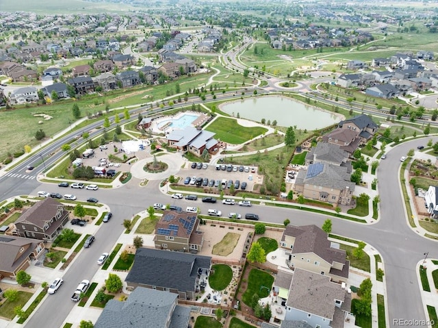 565 Pikes View Dr, Erie, CO 80516 - aerial view of property and surrounding area with nearby suburban area and a large body of water