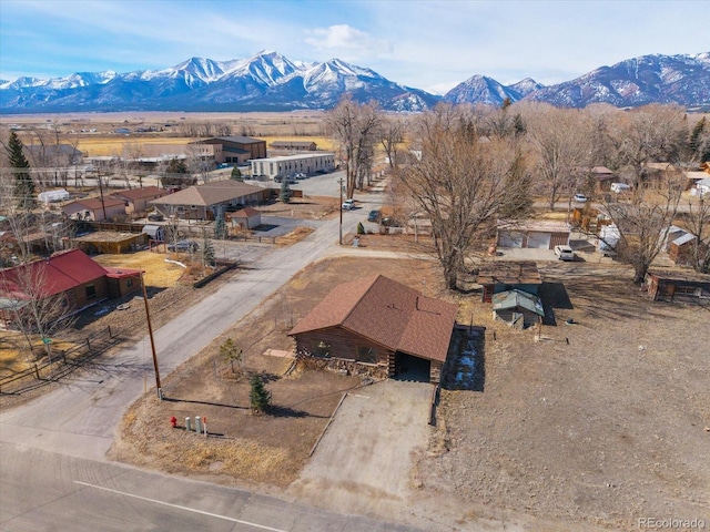 drone / aerial view featuring a mountain view