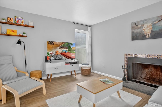 14934 E Hampden Cir Unit 3, Aurora, CO 80014 - living room with wood finished floors and a fireplace