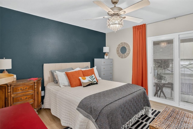 14934 E Hampden Cir Unit 3, Aurora, CO 80014 - bedroom featuring wood finished floors and ceiling fan
