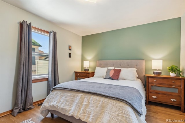 2430 N Tejon St, Colorado Springs, CO 80907 - bedroom with wood finished floors and baseboards