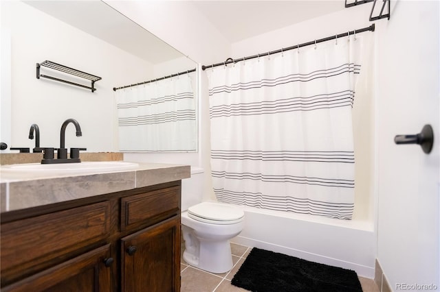 full bathroom featuring shower / bath combination with curtain, vanity, tile patterned floors, and toilet