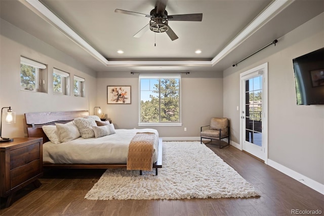 1803 Avenida Del Sol, Castle Rock, CO 80104 - bedroom featuring access to exterior, a tray ceiling, dark wood-style floors, recessed lighting, and a ceiling fan