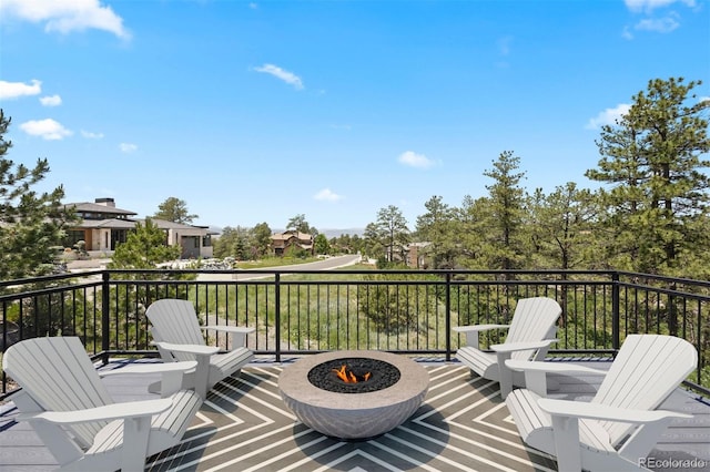 1803 Avenida Del Sol, Castle Rock, CO 80104 - wooden terrace featuring an outdoor fire pit