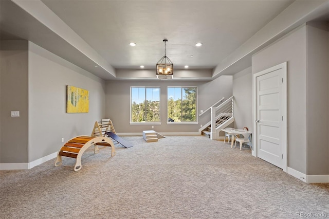 1803 Avenida Del Sol, Castle Rock, CO 80104 - recreation room featuring carpet, recessed lighting, a chandelier, and a tray ceiling