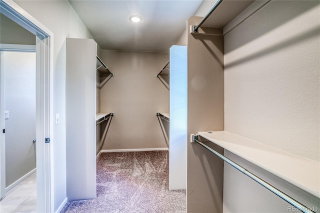 23931 E 40th Ave, Aurora, CO 80019 - walk in closet featuring light carpet