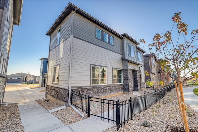 23931 E 40th Ave, Aurora, CO 80019 - view of home's exterior featuring stone siding