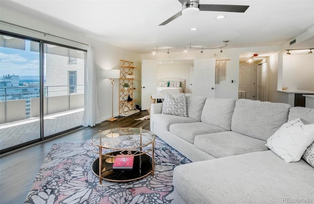 800 Pearl St Unit 1010, Denver, CO 80203 - living area with wood finished floors, a ceiling fan, and recessed lighting