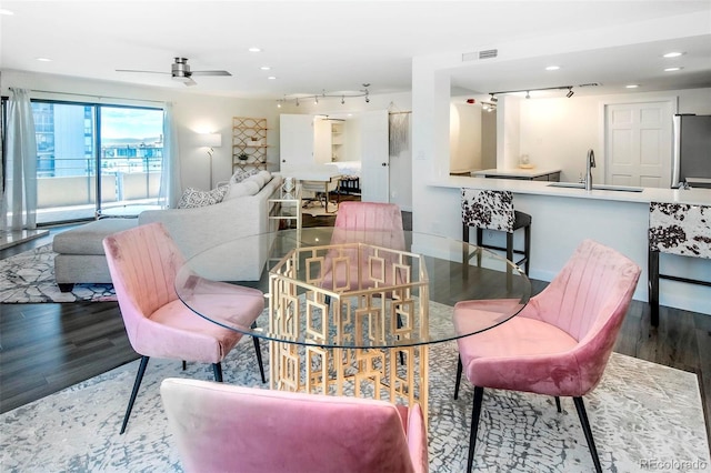 800 Pearl St Unit 1010, Denver, CO 80203 - living room featuring rail lighting, wood finished floors, a ceiling fan, and recessed lighting