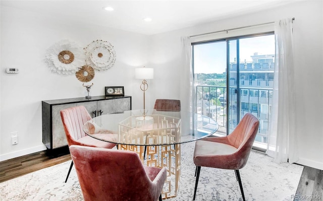 800 Pearl St Unit 1010, Denver, CO 80203 - dining room featuring wood finished floors and recessed lighting
