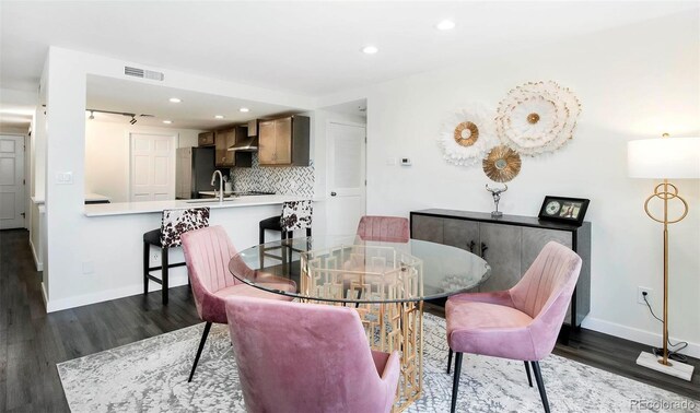 800 Pearl St Unit 1010, Denver, CO 80203 - dining area with dark wood-type flooring and recessed lighting