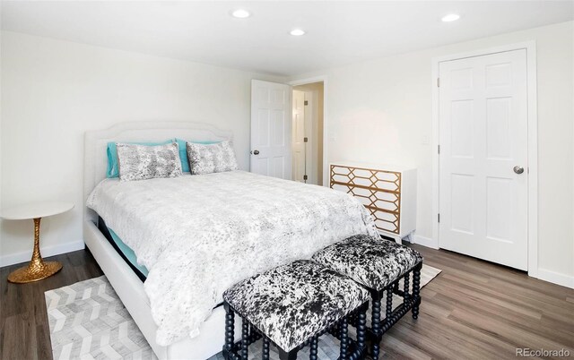 800 Pearl St Unit 1010, Denver, CO 80203 - bedroom featuring recessed lighting and wood finished floors