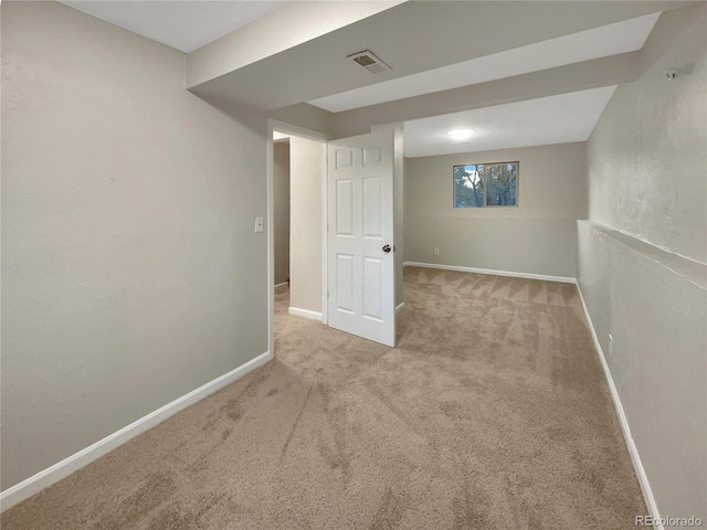 basement with light colored carpet