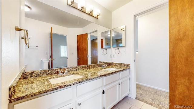 3732 Rosewalk Ct, Highlands Ranch, CO 80129 - bathroom featuring double vanity and tile patterned flooring