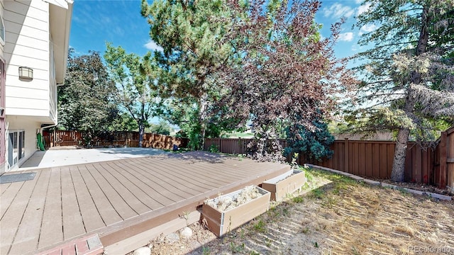 3732 Rosewalk Ct, Highlands Ranch, CO 80129 - wooden deck with a fenced backyard