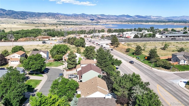 3732 Rosewalk Ct, Highlands Ranch, CO 80129 - drone / aerial view of a water and mountain view