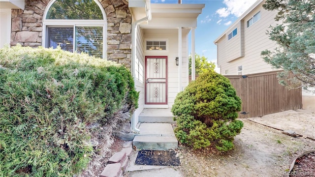 3732 Rosewalk Ct, Highlands Ranch, CO 80129 - doorway to property featuring stone siding