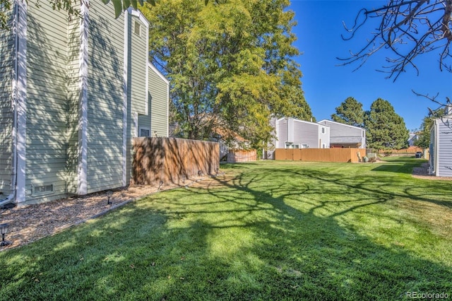 view of yard featuring fence