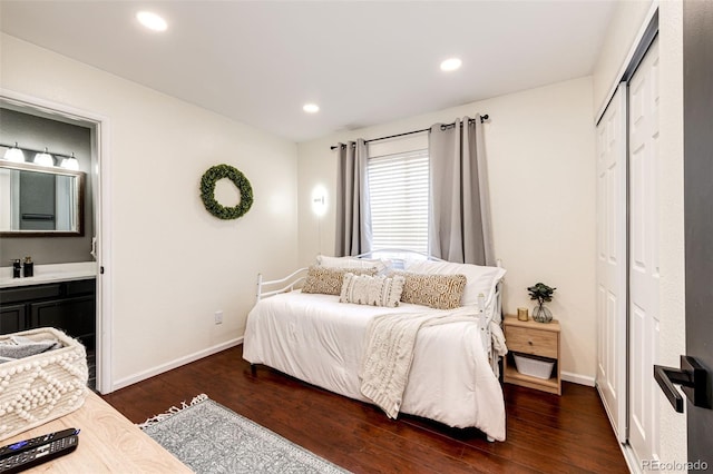8930 Apache Plume Dr, Parker, CO 80134 - bedroom featuring wood finished floors, a closet, ensuite bath, and recessed lighting