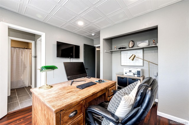 8930 Apache Plume Dr, Parker, CO 80134 - office space featuring an ornate ceiling and dark wood-style flooring