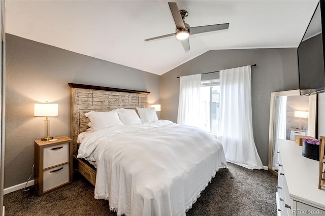 8930 Apache Plume Dr, Parker, CO 80134 - bedroom featuring dark carpet, lofted ceiling, and a ceiling fan