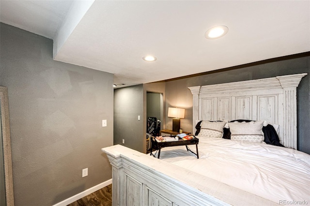 8930 Apache Plume Dr, Parker, CO 80134 - bedroom featuring dark wood-style floors and recessed lighting