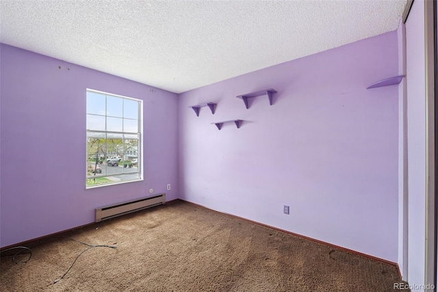 empty room with baseboard heating, carpet flooring, and a textured ceiling