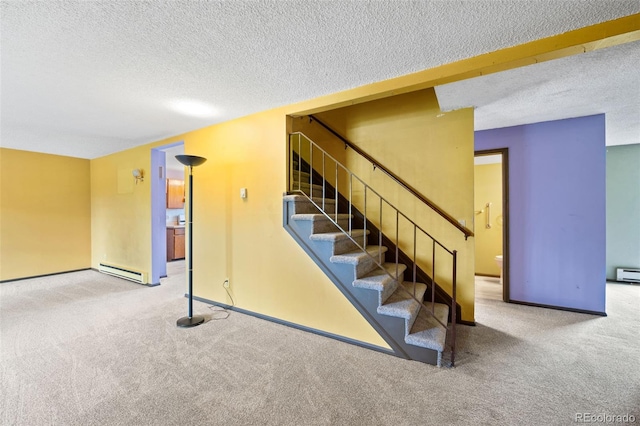 stairs with a baseboard radiator, carpet flooring, a textured ceiling, baseboard heating, and baseboards