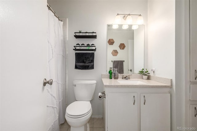 full bath featuring tile patterned floors, toilet, and vanity