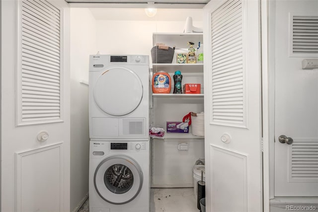 laundry room featuring laundry area and stacked washer and dryer