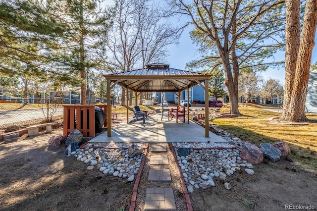 view of yard featuring a gazebo and fence